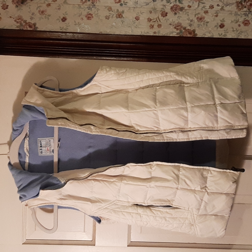 Old Navy white vest. Powder blue lining.